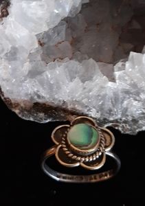 SS ring purchased in Mexico. Abalone shell flower.
